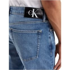 Calvin Klein Jeans Jean Coupe Slim Calvin Klein En Coton Mélangé Bleu Délavé -Passons à la mode masculine ! 112110 144629vt jean coupe slim calvin klein en coton melange bleu delave 04 600x600