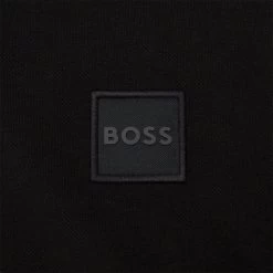 Polo Boss En Maille Piquée De Coton Noir à Manches Longues -Passons à la mode masculine ! 116390 143903vt polo boss en maille piquee de coton noir a manches longues 04 600x600